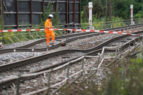 Men on the railway between Rastatt and Karlsruhe, where the land slip happened. Photo credit: Benedikt Spether