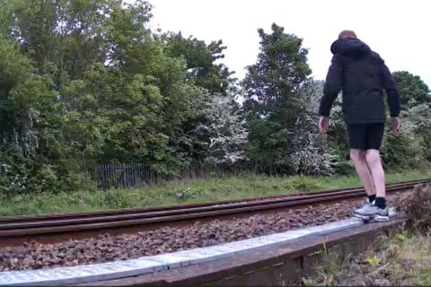 Unidentified hooded male at Billingham in the north east of England trespassing on the line