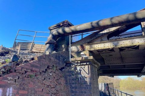 Nuneham Viaduct falling brickwork showing holes and cracks as wide as an arm.