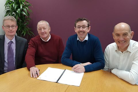 Image of WH David and VTG sign the deal, from left: Jonathan Hamer, Finance Director of WH Davis; Stewart Greenwood, MD of WH Davis; Nigel Day, Engineering Director, VTG Rail UK and Rob Brook, Head of VTG Rail UK at VTG's offices in Birmingham.