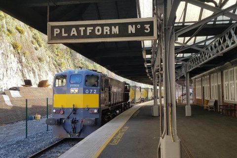 Irish freight train hauling tanktainers through Waterford passenger station