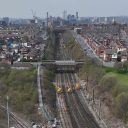 Aerial view of track work in the Neville Hill area of Leeds with the city skyline in the background